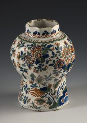  A ceramic vase with a bulbous body and short, flared neck, featuring a hand-painted floral design in dark blue, orange, green, yellow, and brown on a white background.