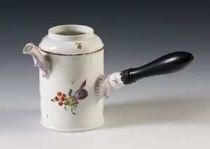  A vintage off-white ceramic chocolate pot with a dark wooden handle, adorned with hand-painted floral designs in red, green, blue, and gold, set against a neutral backdrop.