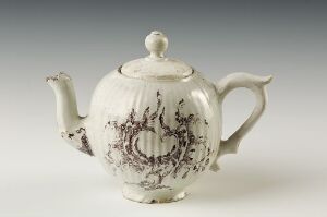  An antique white teapot with a round body, an arched handle, and a spout, featuring gray or light black chinoiserie-style floral and ornamental patterns, displayed against a neutral background. Artistname and title remain unknown.