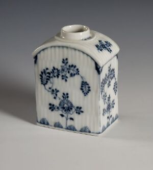  A hexagonal porcelain tea caddy with blue and white floral patterns, displayed against a light grey background.