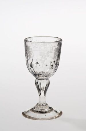  A clear glass goblet with an embossed dot pattern around the bowl and a scalloped design, displayed against a soft white background. The goblet has a slender stem and a flat, round base reflecting light. Artist name and title are unknown.