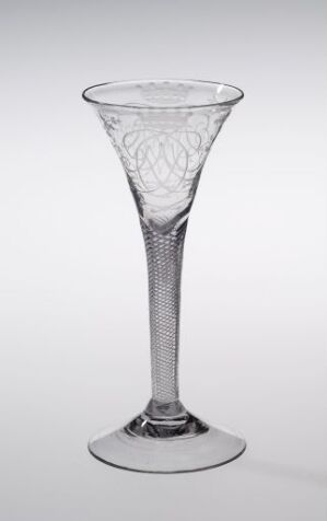  A transparent glass goblet with an ornate diamond pattern on the upper bowl and a twisted rope-like stem, standing against a light gray background.