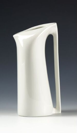  A tall and slim white glazed vitroporcelain pitcher with a modern, minimalist design, created by Figgjo. The pitcher has an integrated handle and a glossy finish, set against a neutral gray to white gradient background.