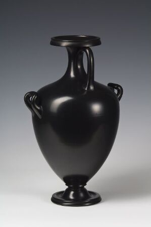 
 A glossy black vase with a classic shape and round base, featuring looped handles on the sides, set against a light grey background.