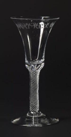  A tall, clear wine glass with a wavy rim and a helical-patterned stem, set against a dark background, reflecting a subtle spectrum of gray tones from bright highlights to deep shadows. Artist name and title unknown.