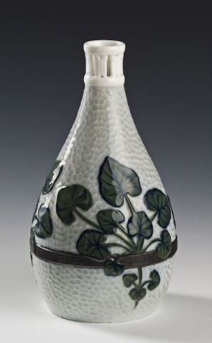  A ceramic vase with a textured light gray or white background, adorned with a delicate band of deep green leaves around its center, embodying a serene and natural aesthetic.