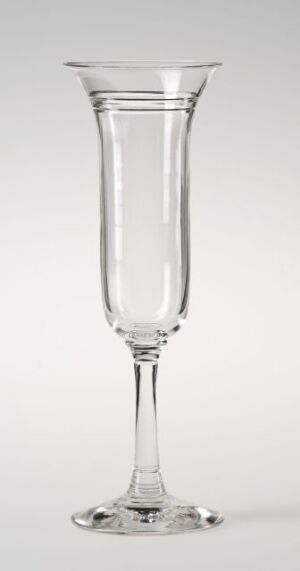  An elegant, clear champagne flute stands against a soft gray background, with slender proportions and a flared base, designed to hold sparkling beverages.