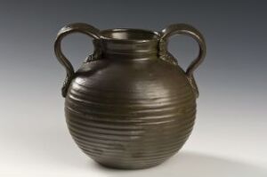 ** Ancient-style ceramic pot with a bulbous body, horizontal ridges, two handles, and a rich brown matte finish on a soft grey background.