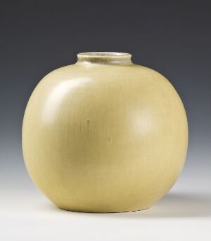  A round-bodied ceramic vase with a short, narrow neck and a flared rim, in a soft creamy yellow color with a glazed finish, set against a neutral gray gradient background.