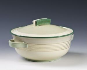  "Astra" serving bowl with lid by Porsgrunds Porselænsfabrik AS, showcasing a neutral creamy base with green accented bands and handles, crafted from feldspar porcelain with overglaze decor.