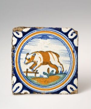  A small square ceramic tile positioned to show as a diamond, featuring a central circular medallion with a painted brown and white speckled horse galloping to the right, bordered by a yellow and cobalt blue decorative band with white crescent shapes, all against a light gray background.