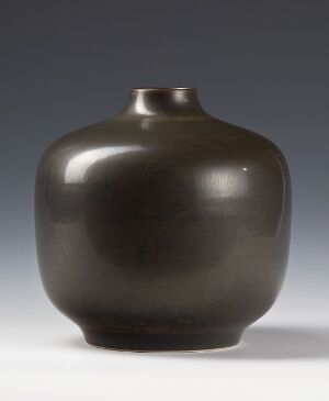  An undecorated, glossy, metallic-like brownish-black ceramic vase with a rounded body and a short narrow neck, set against a gradient background from light grey to white. Artist name and title are unknown.