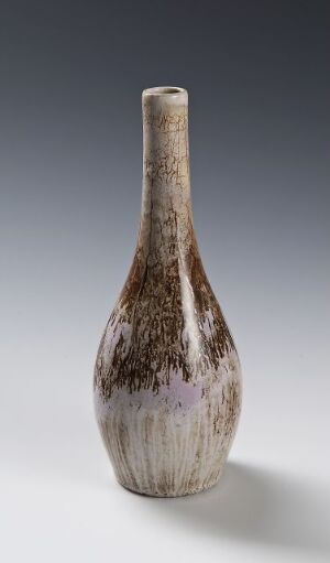  A slender, tapered ceramic vase with earthy beige, brown, and lavender tones and a speckled texture sits against a gradient gray to white background.