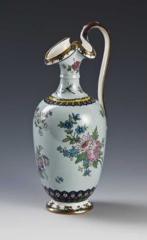  A vintage porcelain jug with a sky blue background and floral motifs in shades of pink, purple, green, and yellow. It features golden accents around the neck and base, as well as along the white handle and spout.