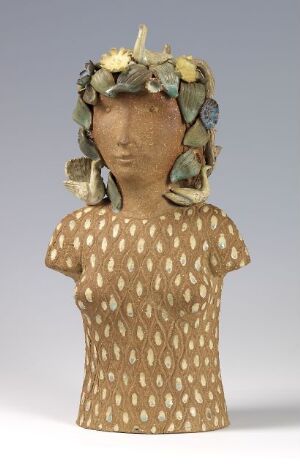  Sculpture of a bust with a leaf crown, showcasing a polka-dotted blouse and simplified facial features, set against a light gradient background.