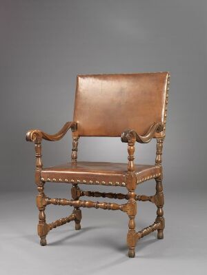  An antique wooden chair with a high backrest and caramel brown leather, featuring turned wood details and ornamentation on a neutral gray gradient background. Artist and title unknown.