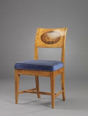  An elegant chair made of Alder wood veneered on pine with mahogany and boxwood intarsia on the backrest, and a seat upholstered in medium blue synthetic silk, by an unidentified artist, titled "Stol".