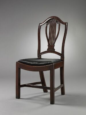  A classic wooden chair with a curved top rail and vertical slats on the backrest, featuring dark brown wooden frame and a black upholstered seat, set against a gradient background that transitions from light at the bottom to dark at the top.