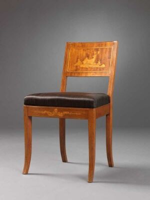  A classic wooden chair with a decorative inlaid wood design on the backrest and a dark brown upholstered seat against a neutral grey background.