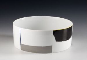  A modern, silver-toned bracelet with a mirror finish featuring a black segment and a blue-gray stripe, set against a gradient white to pale gray background.