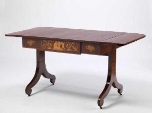  A classical rectangular wooden table with curved edges, decorative inlay in lighter shades on its drawer fronts, elegantly curved legs, and pad feet—set against a neutral grey background.