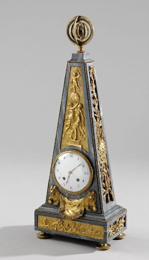  An antique triangular-shaped clock with a dark base color and intricate gold decorative elements, including an embellished crown at the top, flanked by vertical gold panels with relief designs, and a simple white clock face with Roman numerals in the center.