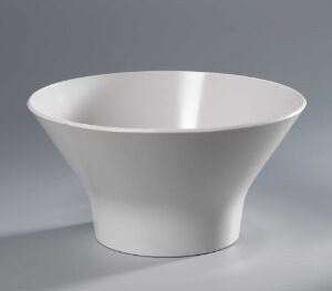  A white ceramic bowl with a rounded, flared design sits against a light grey background, emphasizing its simple and elegant form.