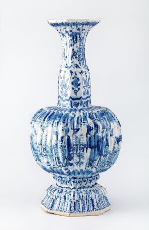  An ornate blue and white porcelain vase with a bulbous body and slender neck, adorned with detailed hand-painted patterns in various shades of blue, suggestive of Delftware or Chinese porcelain craftsmanship.