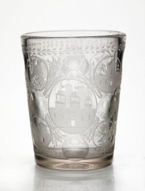  An intricately etched glass with a flared rim and tapered base, featuring decorative patterns and a central oval cartouche depicting a building landscape, against a gradient white-to-grey background.