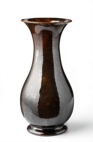  An elegantly shaped vase with a gradual color transition from deep glossy brown at the base to a smoky gray towards the flared neck, set against a white background.