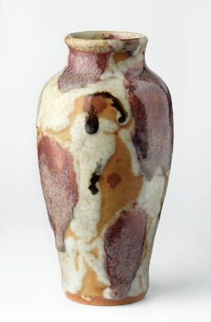  A tall, cylindrical handcrafted vase with a flared rim and base, featuring a glazed pattern in shades of cream, mauve, soft purple, and dark brown, with a marbled and weathered texture giving it an earthy, artisanal appearance.