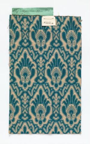  A patterned material featuring an ornamental design in shades of teal, navy blue, and cream, with a solid pale greenish-blue strip at the top, adorned with a white label displaying a handwritten number.