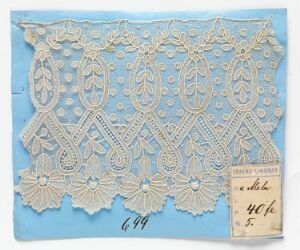  Off-white intricately patterned lace fabric with a floral and geometric design, set against a light blue background, with an old-fashioned handwritten price tag in the bottom right corner. Artist name and title are unknown.