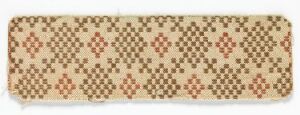  A narrow textile with a beige background showcasing a geometric pattern with larger rust-orange diamonds centered by crosses, surrounded by smaller brown diamonds. Artist name and title are unknown.