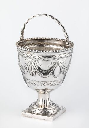  A silver sugar bowl, titled "Sukkerskål" by artist Christian Hosøe, with an embossed design and twisted handle, displayed against a light background.