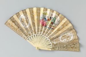  An ornate, partially unfolded hand fan with golden and beige sunbeam stripes, gold decorative elements and painted scenes in oval medallions on a creamy background, showcasing figures in 18th-century attire. Artist and title are unknown.