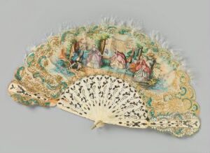  An open antique hand fan with ornate designs featuring historical scenes with figures, decorated with gold scrollwork, and edged with soft white fringe, set against a neutral gray background.