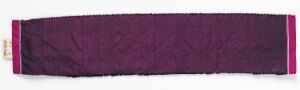  A long, horizontal textile object with a deep purple center and vivid pink edges on a white background.