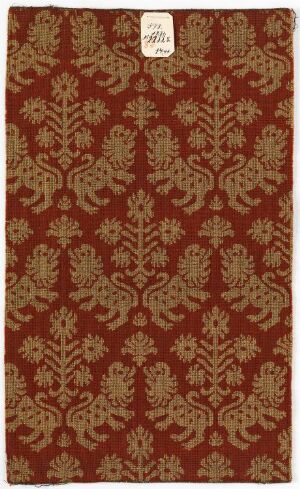  A patterned image displaying a symmetrical design of gold ornamental motifs on a dark maroon background, reminiscent of traditional brocade fabric.