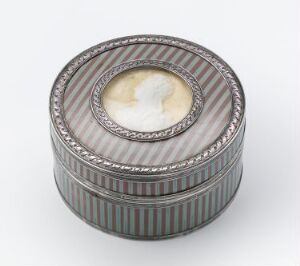  An ornate, circular lacquer box named "Maria Teresia av Østerrike" by an unidentified artist, featuring horizontal stripes in muted teal and gray hues with siseled silver borders and an oval ivory portrait on silk set into the lid, having an anticipated tortoiseshell-lined interior.