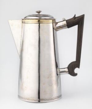  Vintage art deco style silver coffee percolator with a dark, triangular handle and a reflective surface on a neutral background.