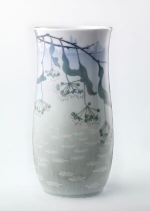  An elegant vase with a soft gradient from milky white at the bottom to pale sky blue at the top, adorned with a dark blue branch and leaf pattern.