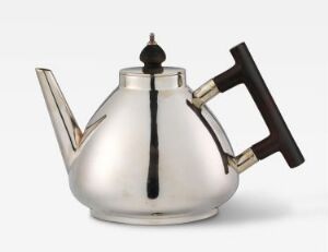  Silver-plated teapot titled "Mod. 2025" by Christopher Dresser, featuring a bulbous shape with a dark wooden handle and lid knob. The sleek design with a reflective silver-gray surface is set against a light gray background.