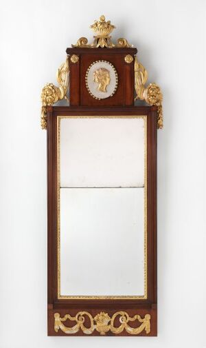  A tall, ornate wooden frame with rich mahogany tones and gold detailing, topped with an elaborate golden crest with a classical central cameo, and decorative gold scrollwork along the sides and bottom.