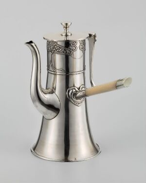  An elegant silver coffee pot with a bell-shaped body and ornate detailing, featuring a curving spout and a contrastingly colored cylindrical handle.