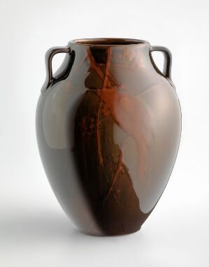  A reflective brown ceramic vase with dark flowing streaks and two handles, set against a white background.