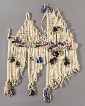  "Lenker," a textile artwork by Brit Haldis Fuglevaag, featuring off-white wool yarn tied and knotted into an intricate, free-form hanging piece with accents of blue, red, and various other colors creating a lively and textured visual display.