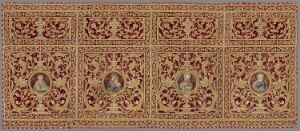  An ornate, rectangular artifact with a symmetrical pattern featuring six panels of floral and vine designs in deep red, orange, and dark brown on a beige background, bordered by a narrower decorative frame of similar style. Artist name and title are unknown.