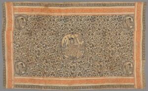  An antique textile featuring a warm beige border with stylized floral patterns and a central dark brown field with intricate designs and a central medallion possibly depicting an animal or emblem.