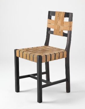  A modern chair with a light grey background. The chair has a black frame and a seat and backrest made of beige to light brown wooden slats, arranged parallel to each other with the back slats weaving through the upper part of the frame.